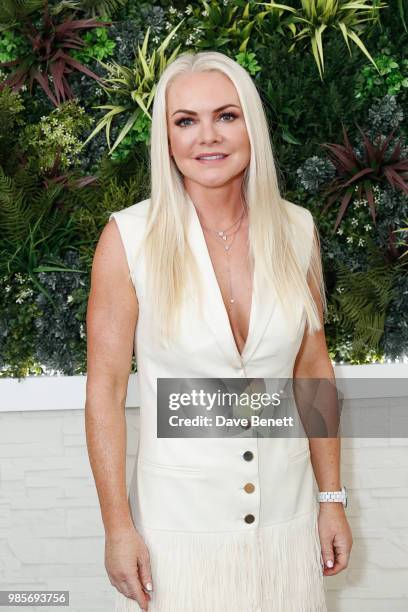 Caroline Mellor attends a private view of photographer Erica Bergsmeds exhibition on June 27, 2018 in London, England.