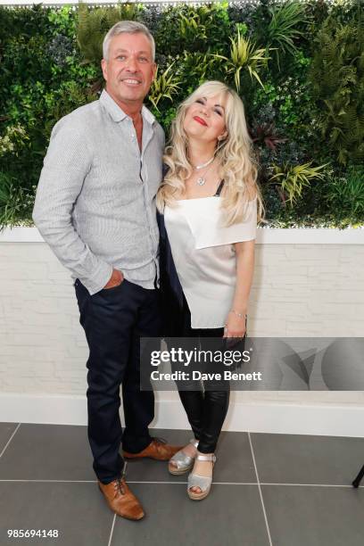 Gary Barber and Alla Pashynska attends a private view of photographer Erica Bergsmeds exhibition on June 27, 2018 in London, England.