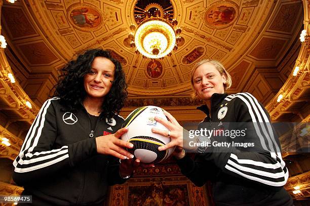 Martina Mueller and Lira Bajramaj of the Women's German national football team pose during the visit of the Semperoper on April 20, 2010 in Dresden,...