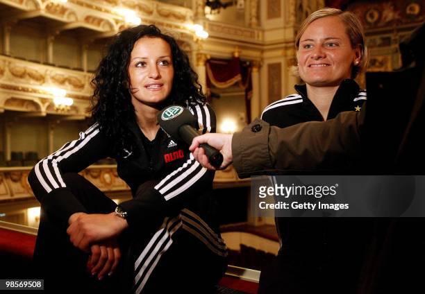 Martina Mueller and Lira Bajramaj of the Women's German national football team pose during the visit of the Semperoper on April 20, 2010 in Dresden,...