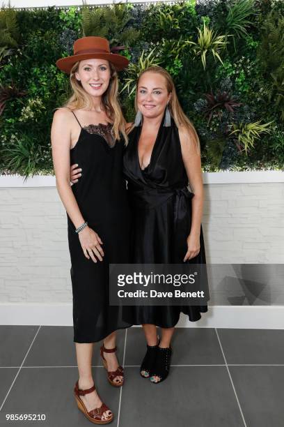 Kylie Olsson and Erica Bergsmeds attend a private view of photographer Erica Bergsmeds exhibition on June 27, 2018 in London, England.