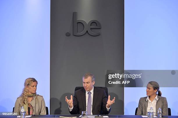 Tennis player Belgium's Kim Clijsters, Prime Minister Yves Leterme and tennis player France's Justine Henin sit during a press conference announcing...