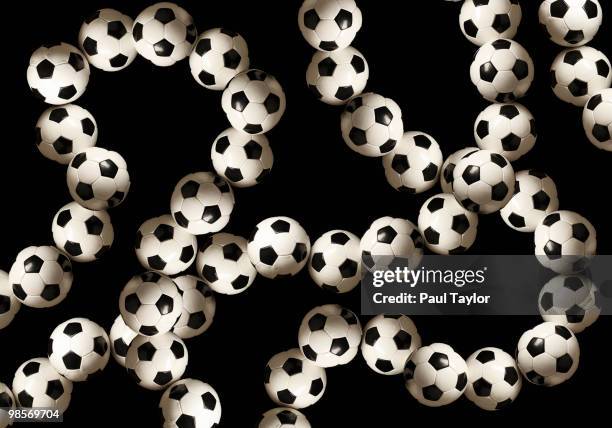 strings of soccer balls - base sports equipment stockfoto's en -beelden