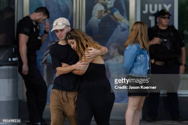 Fans mourn after exiting the XXXTentacion Funeral & Fan Memorial at BB&T Center on June 27, 2018 in Sunrise, Florida.