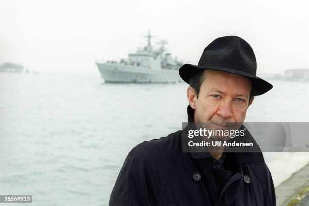 Italian philosopher Giorgio Agamben poses on the Grand Canal during a portrait session held on January 30, 2001 in Venice,Italy.