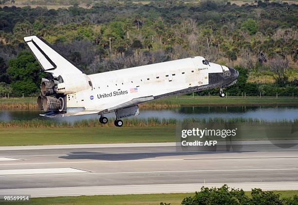 The space shuttle Discovery lands April 20, 2010 at Kennedy Space Center in Florida at the end of a 15-day mission to the International Space...