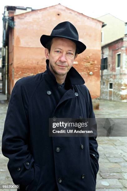 Italian philosopher Giorgio Agamben poses on the Grand Canal during a portrait session held on January 30, 2001 in Venice,Italy.