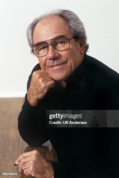 French sociologist, philosopher and cultural theorist Jean Baudrillard poses at home on November 15,1985 in Paris,France.