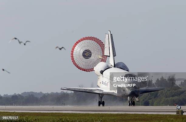 The space shuttle Discovery lands April 20, 2010 at Kennedy Space Center in Florida at the end of a 15-day mission to the International Space...