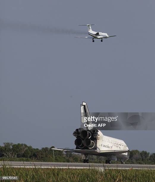The space shuttle Discovery lands April 20, 2010 at Kennedy Space Center in Florida at the end of a 15-day mission to the International Space...