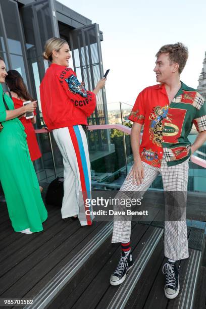 Ashley Roberts and Cowan Fletcher attend the opening of new rooftop bar Savage Garden on June 27, 2018 in London, England.