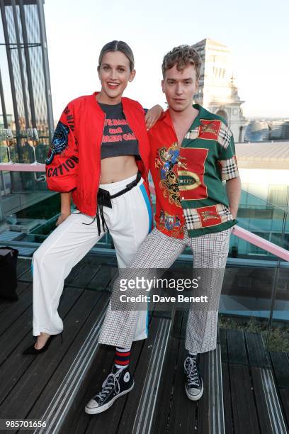 Ashley Roberts and Cowan Fletcher attend the opening of new rooftop bar Savage Garden on June 27, 2018 in London, England.
