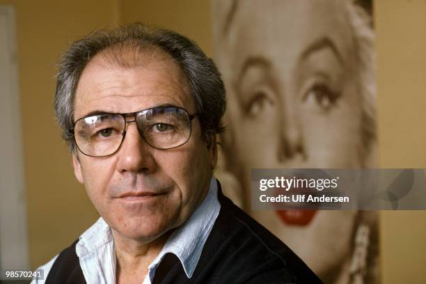 French sociologist, philosopher and cultural theorist Jean Baudrillard poses at home on November 15,1985 in Paris,France.