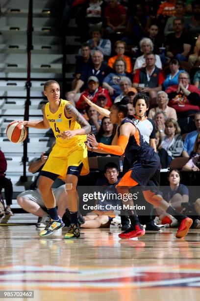 Candice Dupree of the Indiana Fever handles the ball against the Connecticut Sun on June 27, 2018 at Mohegan Sun Arena in Uncasville, Connecticut....