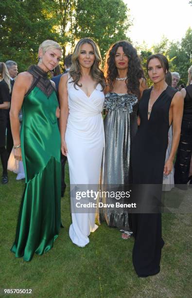 Jo Manoukian, Elizabeth Hurley, Afef Jnifen and Victoria Beckham attend the Argento Ball for the Elton John AIDS Foundation in association with...