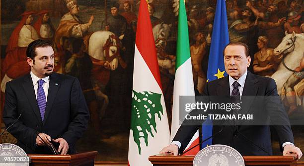 Italian Prime Minister Silvio Berlusconi and Lebanese counterpart Saad Hariri give a joint press conference after their meeting on April 20, 2010 at...