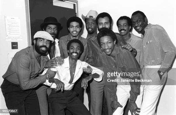 American jazz and R&B group, Kool & the Gang, posing backstage, London, England, 1982. From left, Rick Westfield , Dennis "DT" Thomas , Robert 'Kool'...