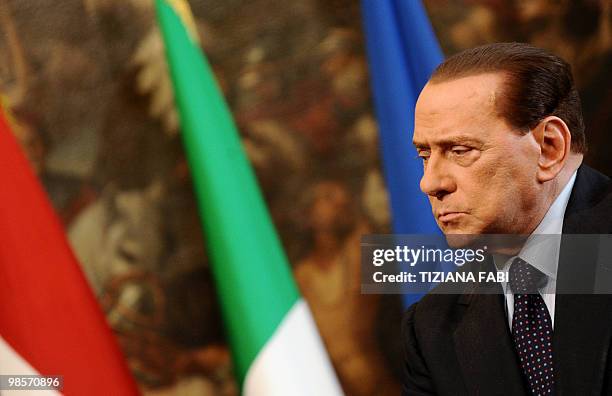 Italian Prime Minister Silvio Berlusconi look on during a meeting with his unseen Lebanese counterpart Saad Hariri on April 20, 2010 at Palazzo Chigi...
