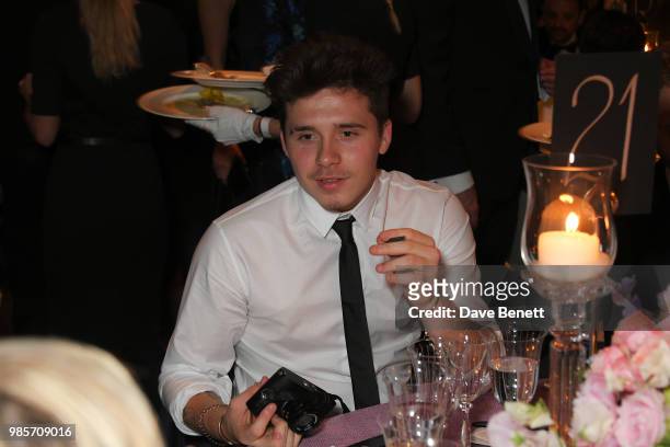 Brooklyn Beckham attends the Argento Ball for the Elton John AIDS Foundation in association with BVLGARI & Bob and Tamar Manoukian on June 27, 2018...