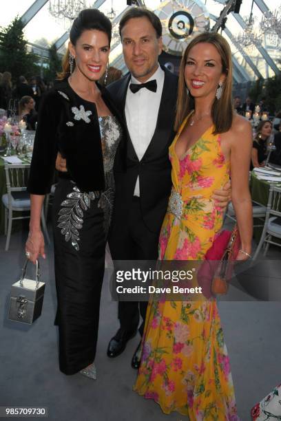 Christina Estrada, Jonathan Lourie and Heather Kerzner attend the Argento Ball for the Elton John AIDS Foundation in association with BVLGARI & Bob...