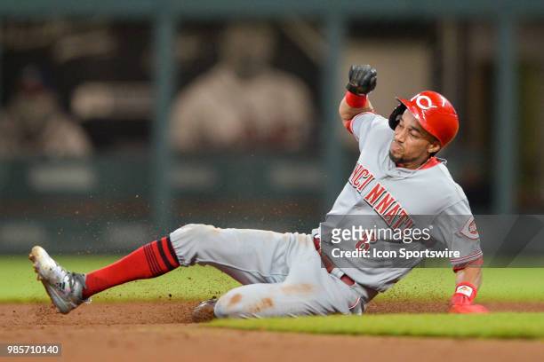 Reds outfielder Billy Hamilton slides safely into second base during the game between Atlanta and Cincinnati on June 25th, 2018 at SunTrust Park in...