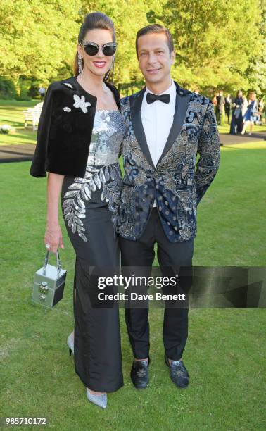 Christina Estrada and Robert Tateossian attend the Argento Ball for the Elton John AIDS Foundation in association with BVLGARI & Bob and Tamar...