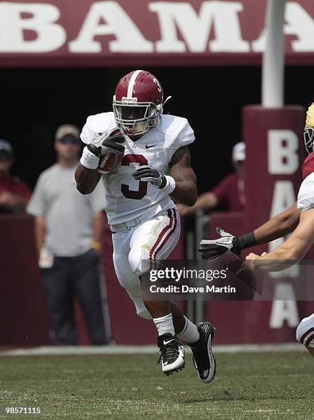 Running back Trent Richardson runs for yardage during the Alabama spring football game at Bryant Denny Stadium on April 17, 2010 in Tuscaloosa,...