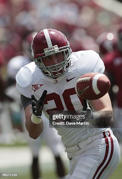 Tight end Nate Carlson of the Alabama Crimson Tide catches a pass during the Alabama spring game at Bryant Denny Stadium on April 17, 2010 in...