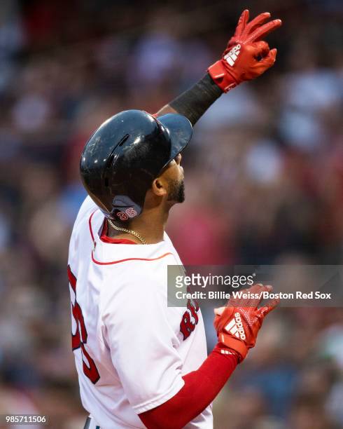 Eduardo Nunez of the Boston Red Sox reacts after hitting a solo home run during the second inning of a game against the Los Angeles Angels of Anaheim...