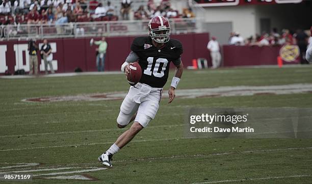 Quarterback A. J. McCarron of the Alabama Crimson Tide runs for a first down during the Alabama spring game at Bryant Denny Stadium on April 17, 2010...