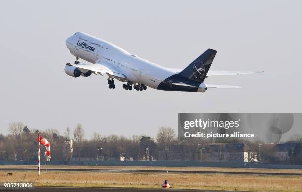 Boeing 747-8 departs from the Tegel airport in Berlin, Germany, 8 February 2018. Lufthansa launches the redesign of their crane logo on the occasion...