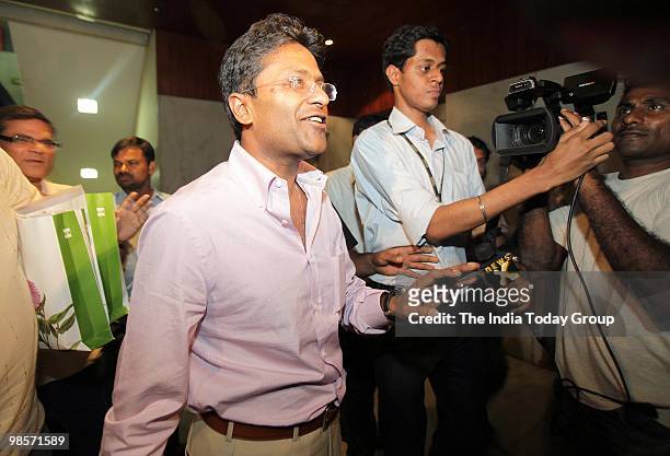 Indian Premier League Commissioner Lalit Modi came out of his Worli-based office early on Friday after Income Tax officials grilled him for eight...
