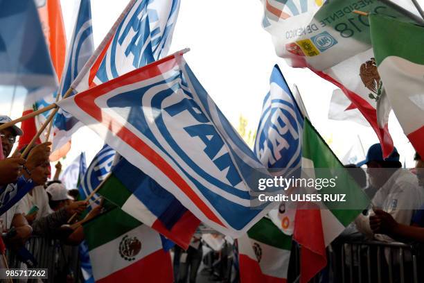 Supporters of Mexico's presidential candidate Ricardo Anaya, standing for the "Mexico al Frente" coalition of the PAN-PRD-Movimiento Ciudadano...