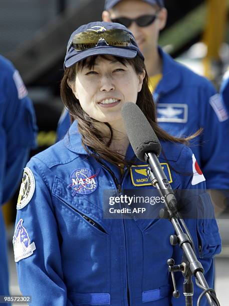 Mission specialist Naoko Yamazaki of the Japan Aerospace Exploration Agency speaks after the space shuttle Discovery landed April 20, 2010 at Kennedy...