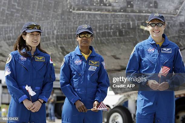 Mission specialists Naoko Yamazaki of the Japan Aerospace Exploration Agency , Stephanie Wilson and Dorothy Metcalf-Lindenburger after the space...