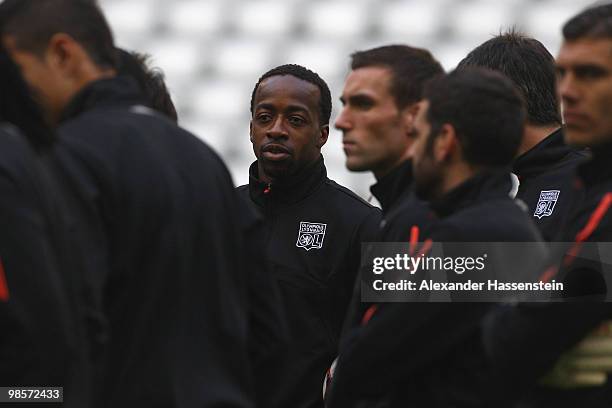 Sidney Govou of Olympic Lyon looks on during a training session at Allianz Arena on April 20, 2010 in Munich, Germany. Olympic Lyon will play against...
