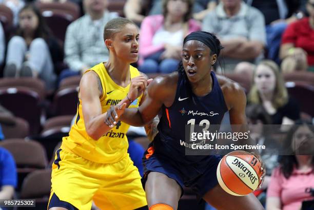 Connecticut Sun forward Chiney Ogwumike defended by Indiana Fever forward Candice Dupree during a WNBA game between Indiana Fever and Connecticut Sun...