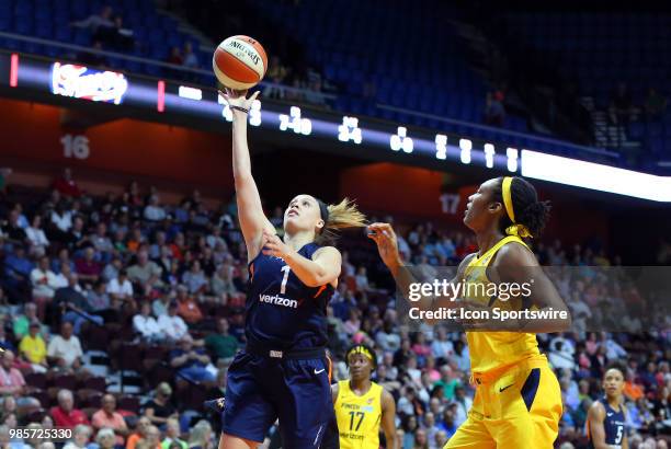 Connecticut Sun guard Rachel Banham drives to the basket during a WNBA game between Indiana Fever and Connecticut Sun on June 27 at Mohegan Sun Arena...