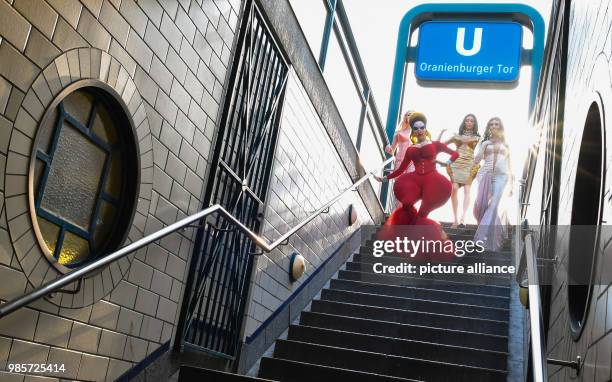 Dancers of the Friedrichstadt-Palast impersonating famous personalities such as Madonna , Divine, Kim Kardashian and Conchita Wurst, arrive for a...