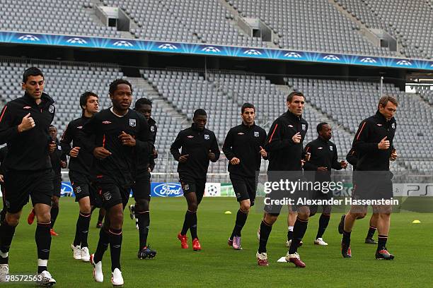 Players of Lyon run during a training session at Allianz Arena on April 20, 2010 in Munich, Germany. Olympic Lyon will play against Bayern Muenchen...