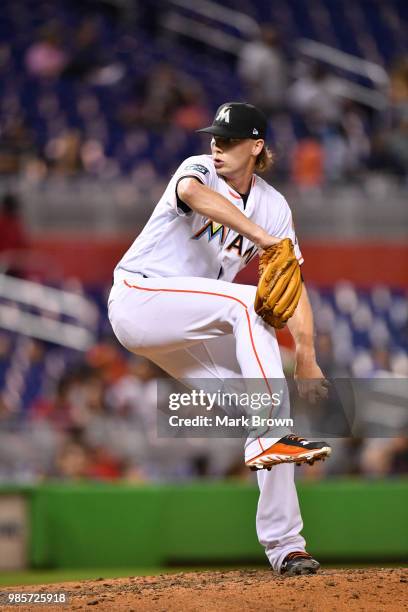 Adam Conley of the Miami Marlins gives up the go ahead home run in the eighth inning during the game against the Arizona Diamondbacks at Marlins Park...