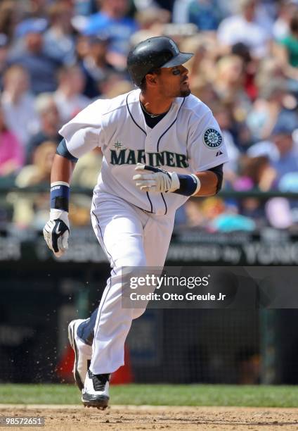 Franklin Gutierrez of the Seattle Mariners runs up the first base line on a double against the Detroit Tigers at Safeco Field on April 18, 2010 in...