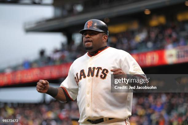 Pablo Sandoval of the San Francisco Giants celebrates after scoring on a Mark DeRosa single in the sixth inning against the Atlanta Braves during an...