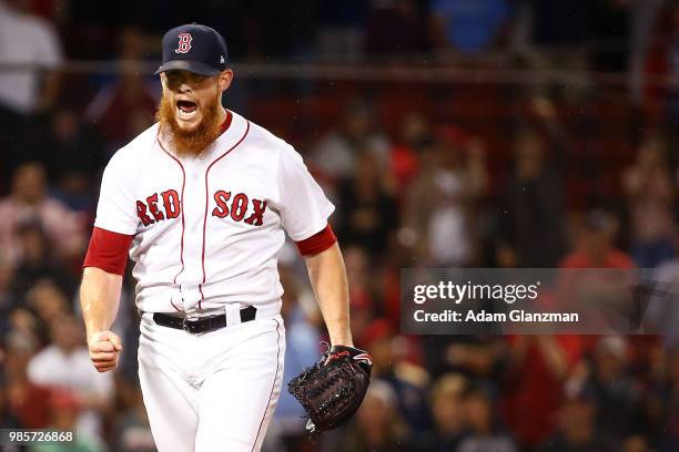 Craig Kimbrel of the Boston Red Sox reacts after making the third out in the eighth inning of a game against the Los Angeles Angels at Fenway Park on...