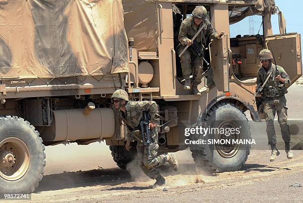 French military personnel take position on April 20, 2010 during the final day of Franco-Djiboutian military exercise in Djibouti. In June 2008...