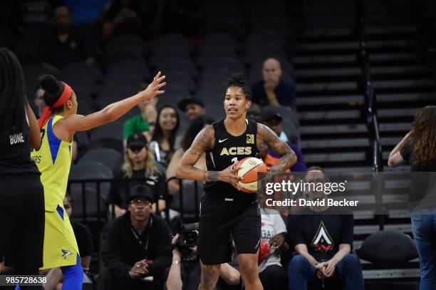 Tamera Young of the Las Vegas Aces handles the ball against the Dallas Wings on June 27, 2018 at the Mandalay Bay Events Center in Las Vegas, Nevada....