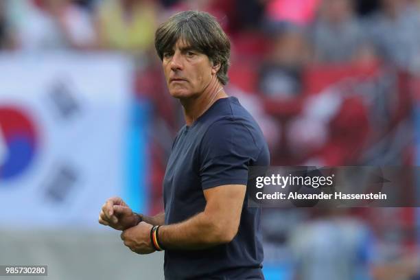Joachim Loew, head coach of Germany walks over the field after loosing the 2018 FIFA World Cup Russia group F match between Korea Republic and...