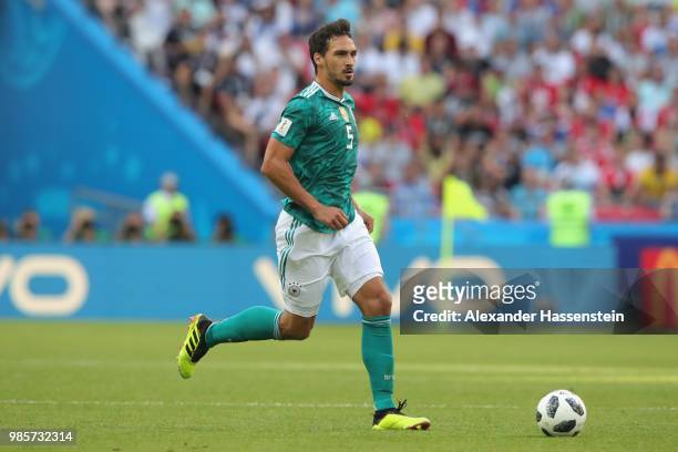 Mats Hummels of Germany runs with the ball during the 2018 FIFA World Cup Russia group F match between Korea Republic and Germany at Kazan Arena on...