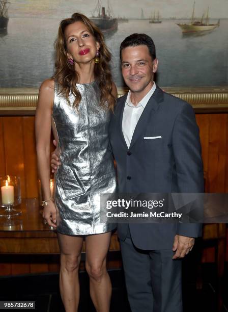 Alysia Reiner and David Alan Basche attend The Cinema Society With Synchrony And Avion Host A Screening Of Marvel Studios' "Ant-Man And The Wasp" -...