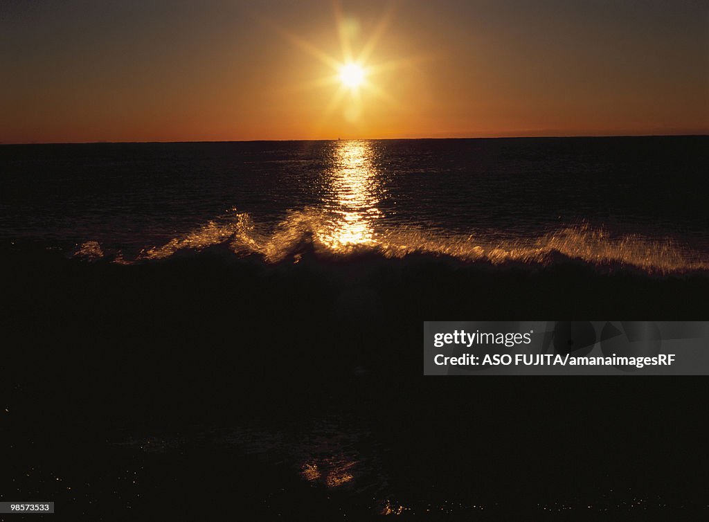 Waves during sunrise on Shonan seashore. Odawara, Kanagawa Prefecture, Japan
